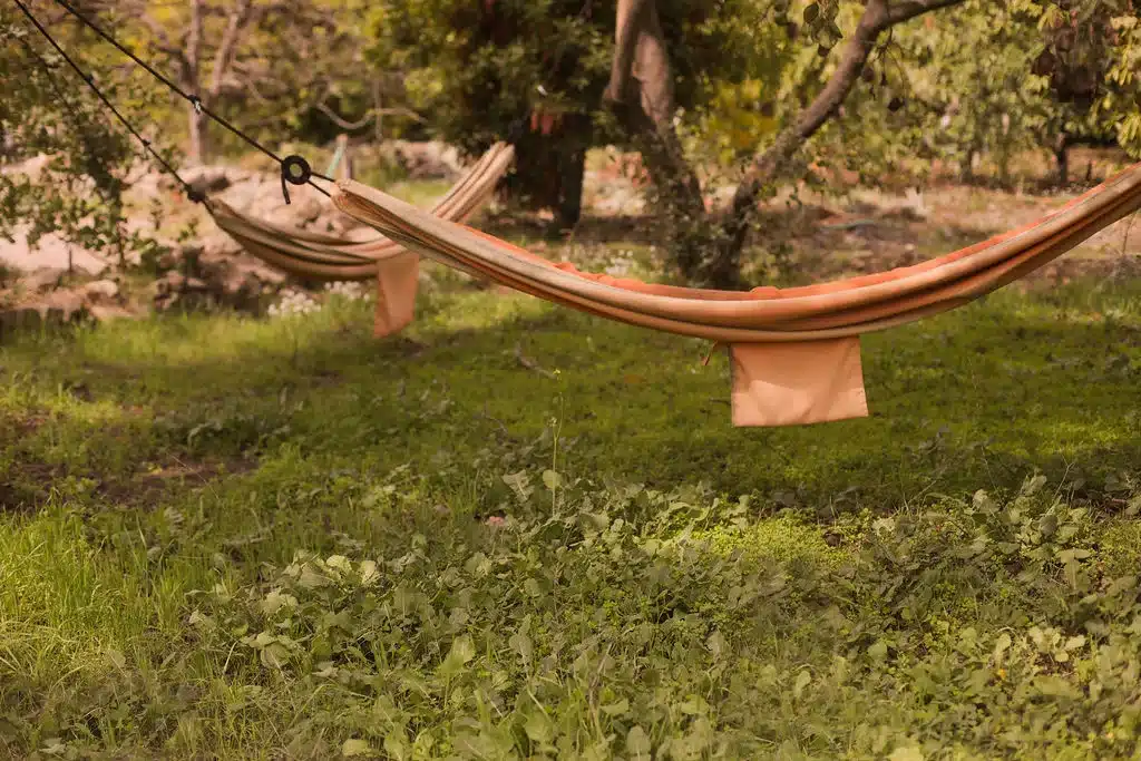 Orange hammock between trees, a place to rest after a Gridley Trail hike in Ojai, CA