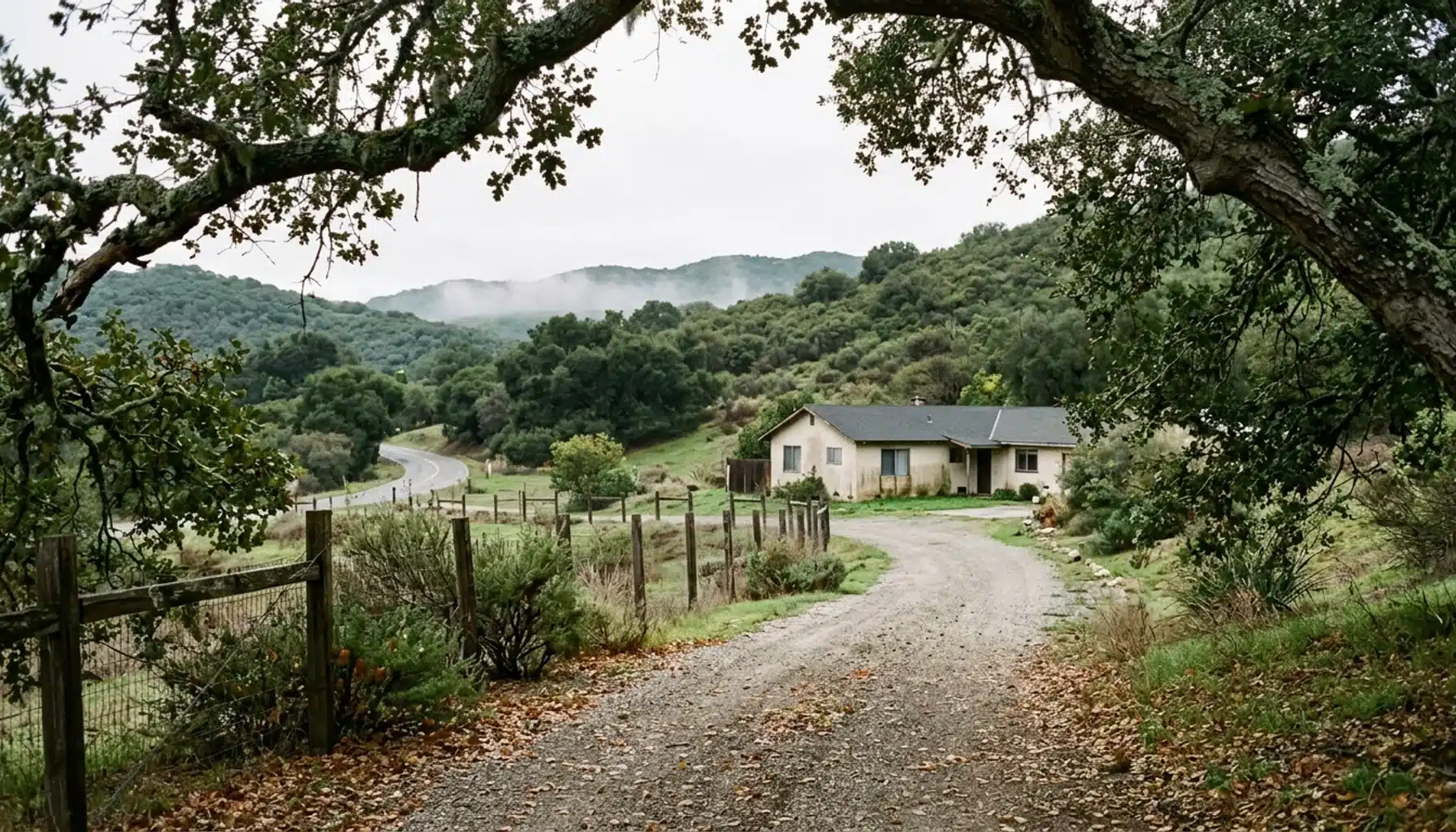 Rural road and ranch-style house near Casitas Springs, setting for a Johnny Cash Ojai home visit guide