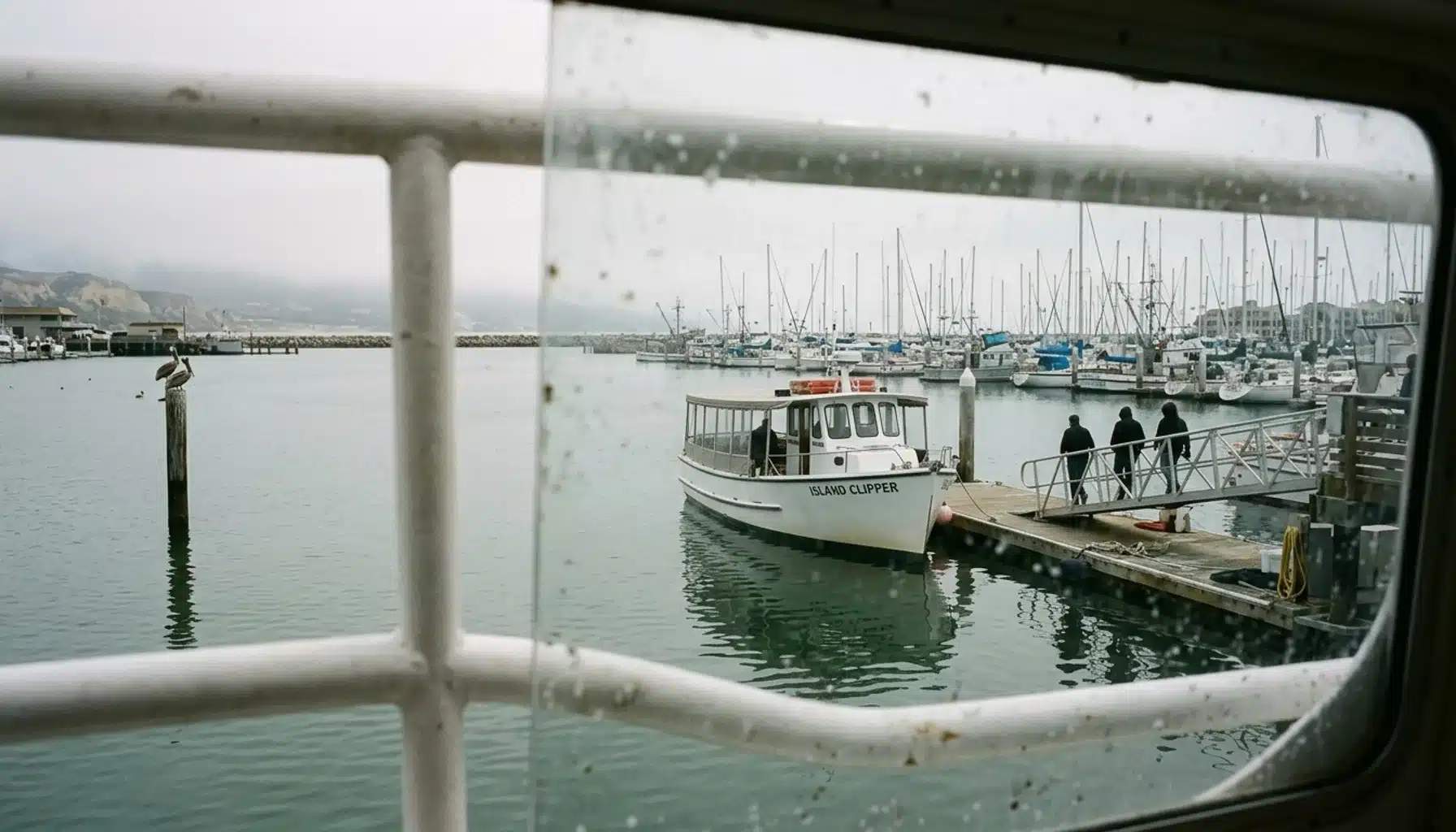 Ventura Harbor boat dock on a misty morning, a starting point for things to do in Ventura County California